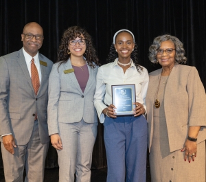 Student receiving award