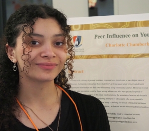 Student presenting poster