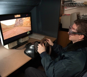 Student working with virtual reality driving