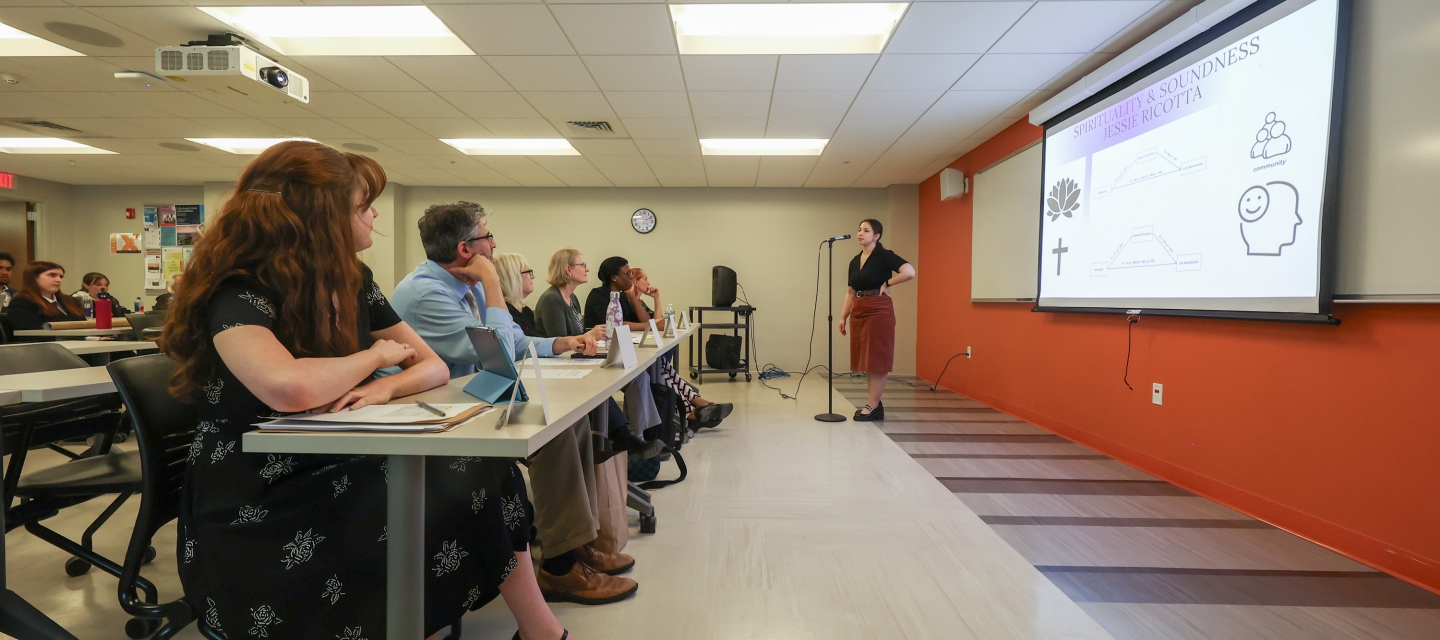 Student presenting research